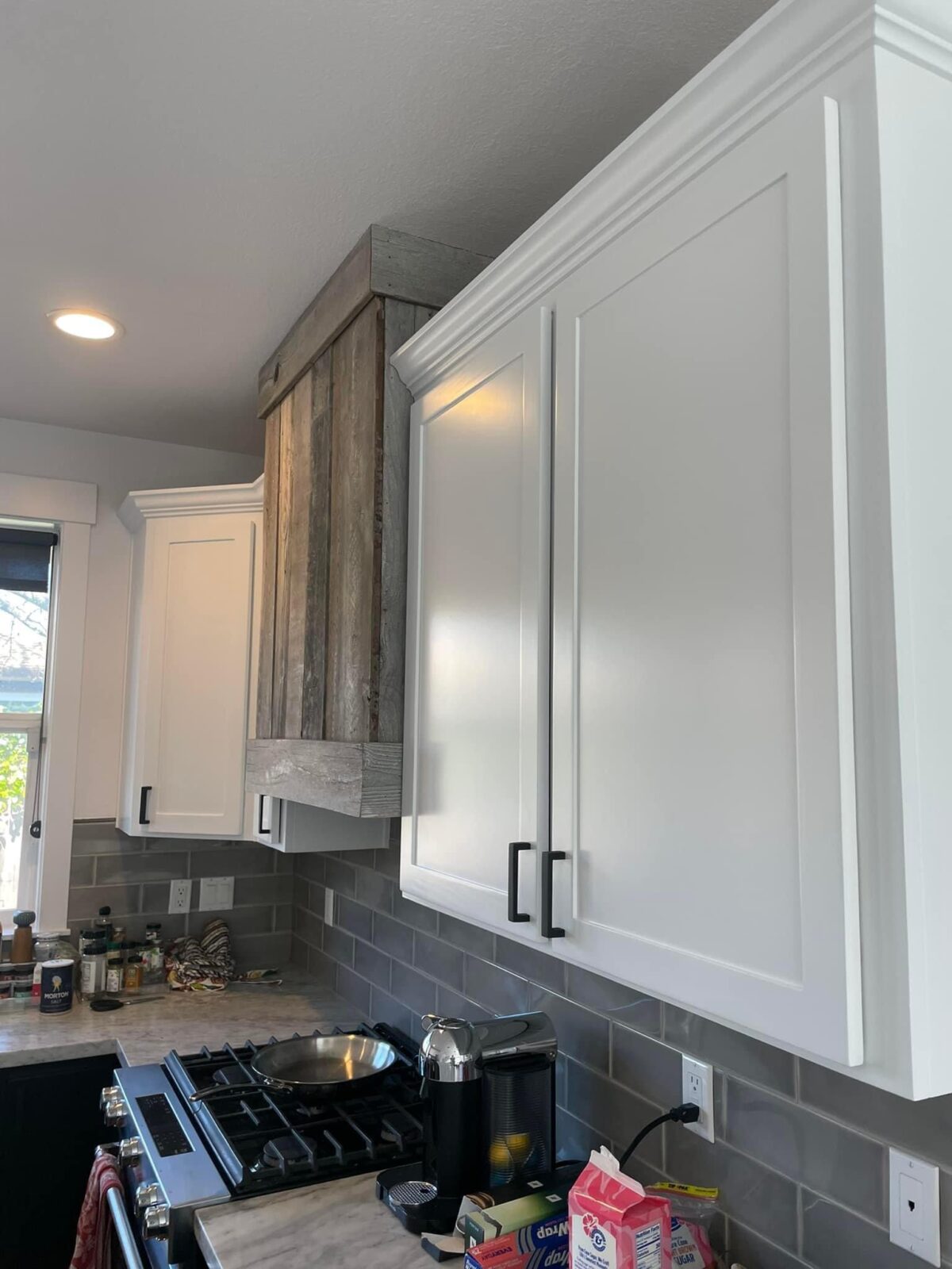 Close-up of smooth white painted cabinet doors