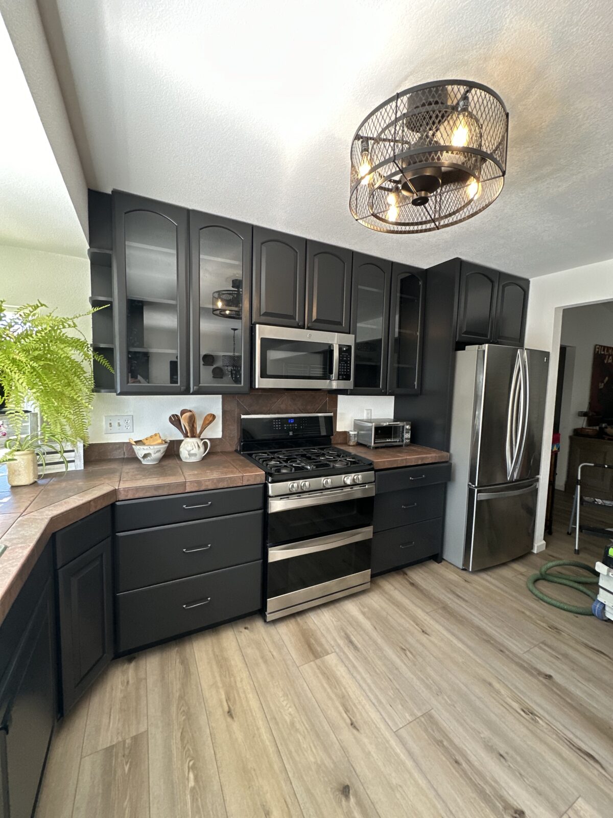 Kitchen cabinets refinished in charcoal