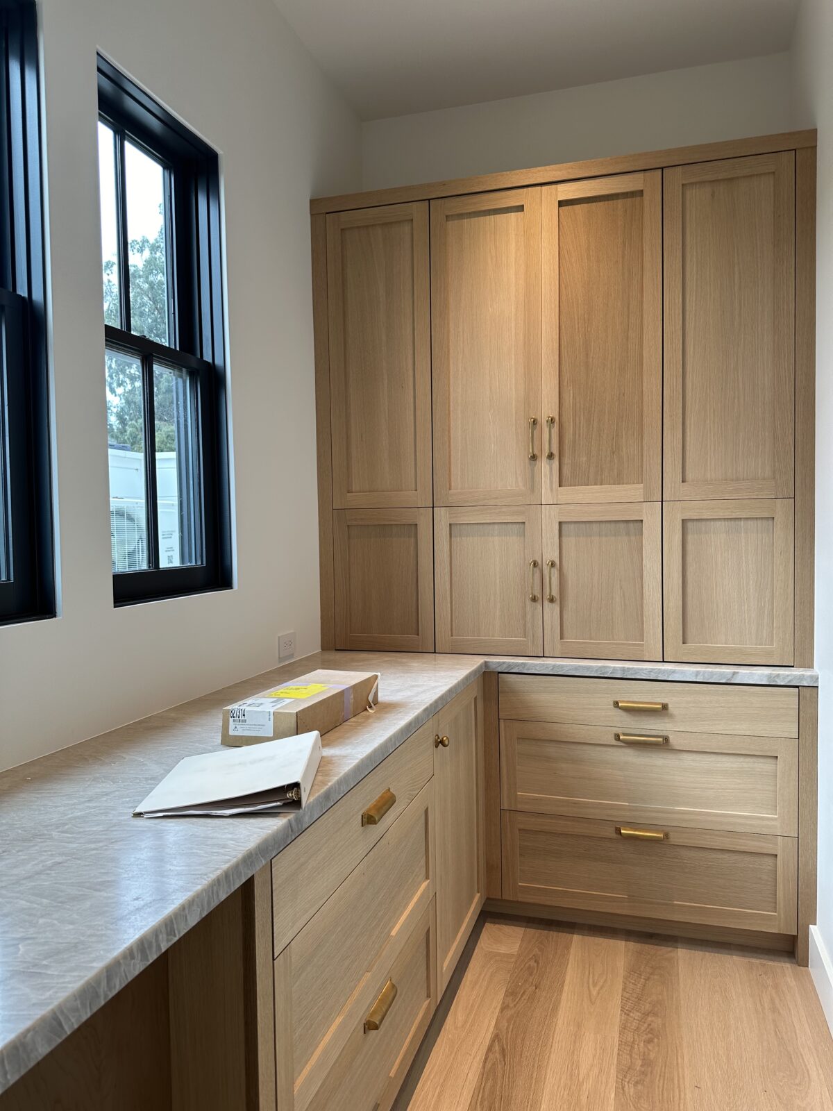 Light natural wood cabinets in a kitchen